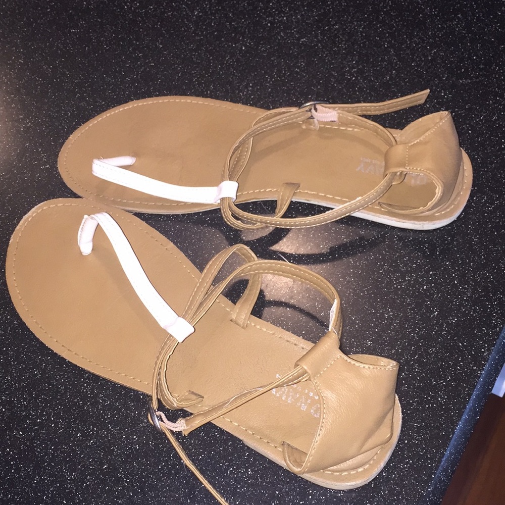 White and tan sandals
